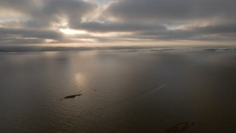 Flying-over-Olsofjord--at-sunset-time.-Drone-footage