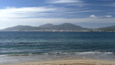 Seascape-of-a-beach-and-Ajaccio-bay,-beautiful-sunny-day,-France