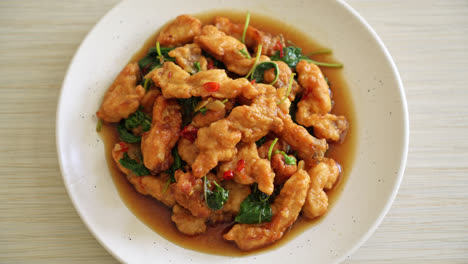 stir-fried-fried-fish-with-basil-and-chili-in-thai-style---Asian-food-style