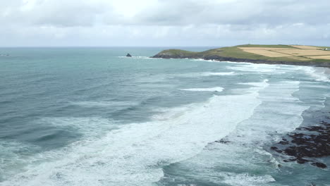 Aerial-view-over-Constantine-Bay-looking-towards-Trevose-Head,-Cornwall,-England