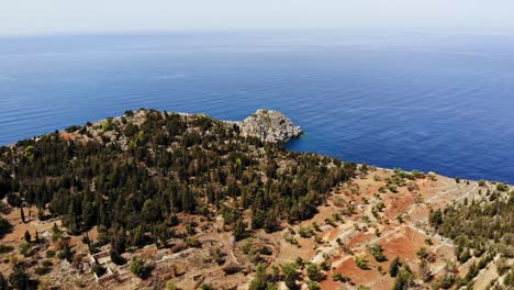 Aerial-View-Of-Rocky-Cliff-And-Green-Forest-In-Cephalonia-Island-In-Greece
