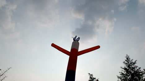 Tube-Man---Looking-Up-Of-Air-Dancer-Against-Sky-On-ABright-Day