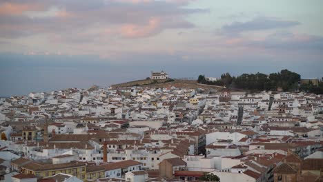Beautiful-church-on-top-of-hill-over-typical-spanish-town-in-Andalusia