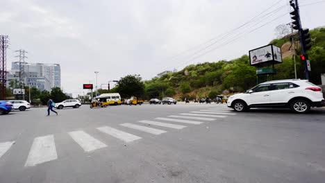 POV-of-a-driver-stuck-in-traffic-and-watching-the-vehicles-on-the-opposite-turning-and-moving-to-the-other-side