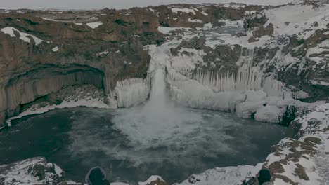Tourist-Photographers-at-Picturesque-Aldeyjarfoss-Waterfall-in-Iceland---Aerial