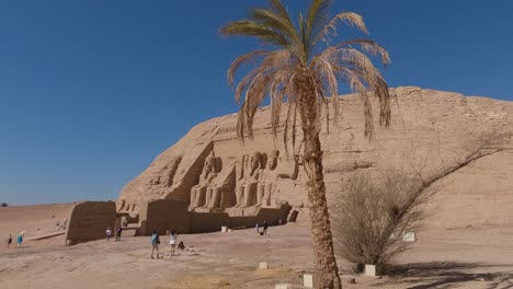 Historic-site-Abu-Simbel-in-Egypt,-tourist-attraction-Great-Temple-of-Ramesses-II,-four-colossal-statues