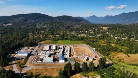 Aerial-View-Over-Mission-Institution,-Medium-Security-In-Mission,-British-Columbia,-Canada---drone-shot