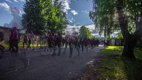 Timelapse-shot-of-crowd-entering-the-stadium-to-watch-RX-World-Rally-Cross-Championship-in-Riga,Latvia-on-a-sunny-day