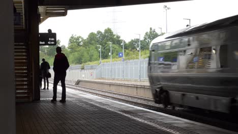 People-At-Park-West-Train-Station-Waiting-For-A-Train-Traveling-To-Dublin-City-Centre-In-Ireland