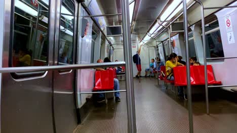 Inside-of-a-subway-train-arriving-at-a-station-in-Brasilia,-Brazil