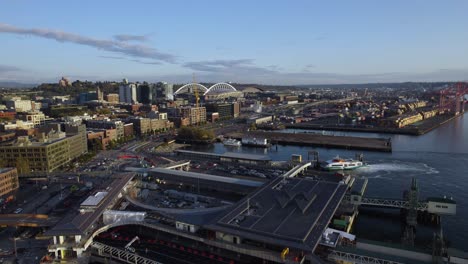 Aerial-view-of-the-Lumen-Field-stadium-at-the-port-of-Seattle,-golden-hour-in-northwest-USA