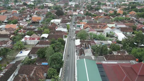 Aerial-shot-of-settlement-and-roads-in-the-city-of-Yogyakarta,-Indonesia