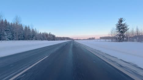 Timelapse-shot-driving-along-and-overtaking-vehicles-on-the-Helsinki-highway