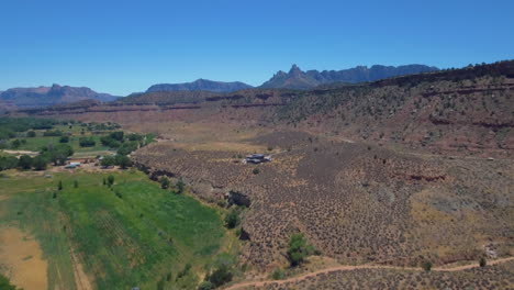 Drone-shot-of-Mount-Zion-mountain-range-with-blue-skies-in-the-background-located-in-Southern-Utah