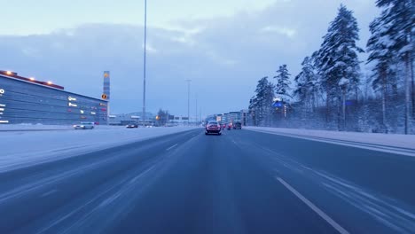POV-shot-driving-along-highway-roads-in-downtown-Helsinki
