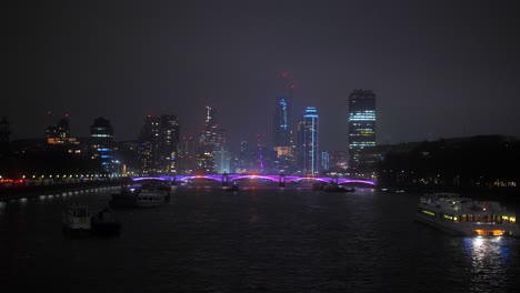 Colorful-Lights-At-The-Modern-City-Of-London-During-Night-With-Thames-River-In-England,-UK