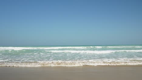 Calm-waves-on-the-shore-of-the-beach-in-TampicoStability-shot-of-the-calm-waves-on-the-shore-of-the-beach-in-Tampico