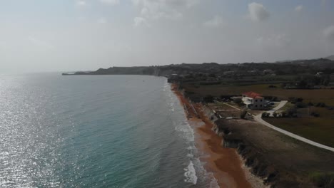 Scenic-Seascape-At-Megas-Lakkos-Beach-In-Greece-On-A-Cloudy-Day---aerial-drone-shot