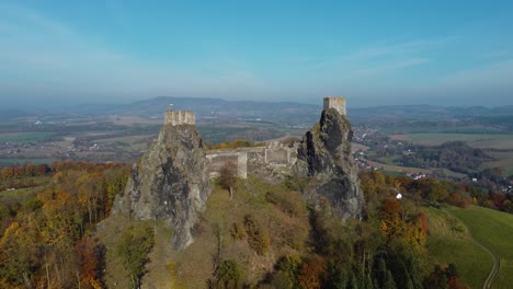 aerial-view-of-a-czech-castle-Trosky-in-Bohemian-Paradise,-sunny