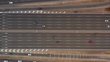 Slow-ascent-of-a-drone-revealing-the-large-number-of-lanes-on-which-thousands-of-vehicles-travel-and-drive-on-the-great-Pan-American-highway-in-South-America