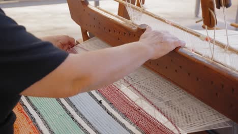 Making-a-carpet-with-a-traditional-weaving-loom