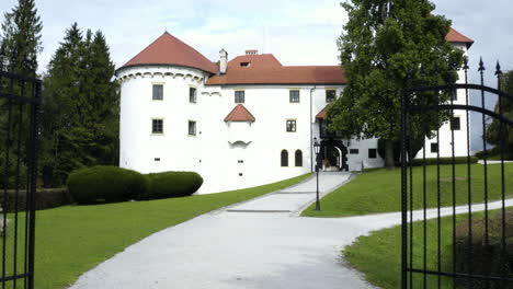 AERIAL---Bogensperk-Castle-in-Lower-Carniola,-Slovenia,-forward-rising-tilt-down