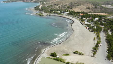 AERIAL---Beautiful-Monte-Rio-beach,-Azua,-Dominican-Republic,-circle-pan
