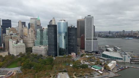 Aerial-view-of-the-cityscape-of-lower-Manhattan,-cloudy-NYC---circling,-drone-shot