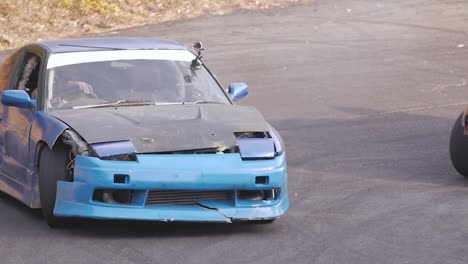 Pair-of-Nissan-Silvia-Cars-Drifting-Around-a-Corner-in-Slow-Motion