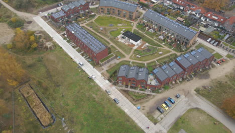 jib-down-of-a-new-suburban-neighborhood-with-solar-panels-on-rooftop