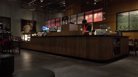 Empty-and-desolate-coffee-shop-during-Covid-19-pandemic,-low-angle-static