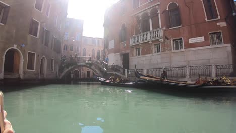 Taking-a-gondola-ride-in-Venice,-Italy-is-a-must-when-you-visit-this-city