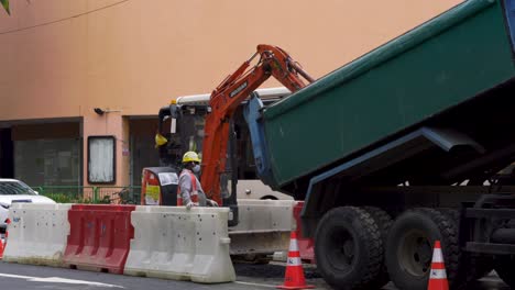 Constructions-workers-working-on-improve,-repair-Singapore-roads