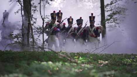 French-soldiers-attacking-enemy-in-dense-fog-through-the-lush-forest