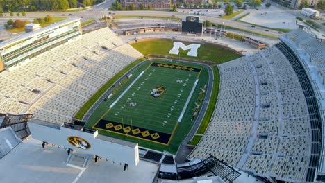 Football-Season-Concept---Nobody-in-Mizzou-College-Football-Stadium-Panorama,-Aerial-Orbit-Drone-View