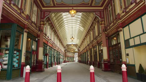 Lockdown-in-London,-slow-motion-gimbal-walk-down-completely-empty-Leadenhall-Market,-during-the-COVID-19-pandemic-2020