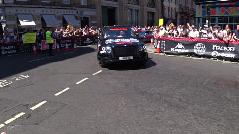 Parade-of-expensive-luxury-sportive-cars-presenting-on-Gumball-3000-Show-in-London-during-sunny-day