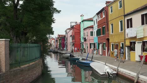 Beautiful-canal-with-boats-at-city-of-Burano