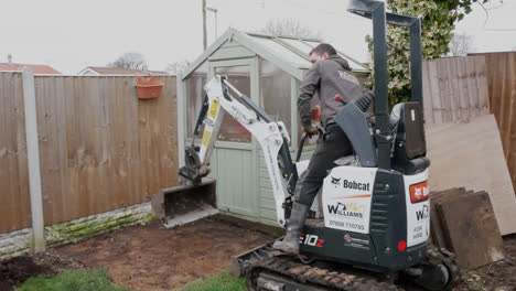 Man-Using-A-Micro-Digger,-Landscape-Gardening-Project