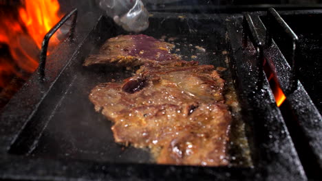 Preparing-roast-beef-in-restaurant,-close-up,-Mediterranean
