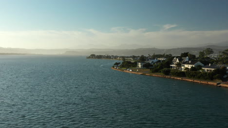 Aerial-View-Of-Luxury-Accommodation-And-Lodge-At-Leisure-Island-Overlooking-Knysnarivier-In-Knysna,-South-Africa