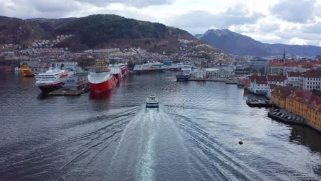 Expressboat-arriving-Bergen-city,-Norway---Aerial