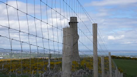 Wire-Fence-And-The-Yellow-Gorse-Wildflowers-On-Top-Of-The-Carrickgollogan-Hill
