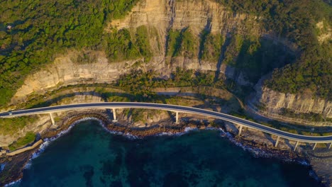 Drone-Videography-Over-Sea-Cliff-Bridge-In-Wollongong,-Australia---aerial-shot