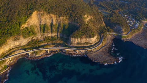 Aerial-View-Of-Sea-Cliff-Bridge-Along-The-Ocean-Of-New-South-Wales,-Australia---drone-shot