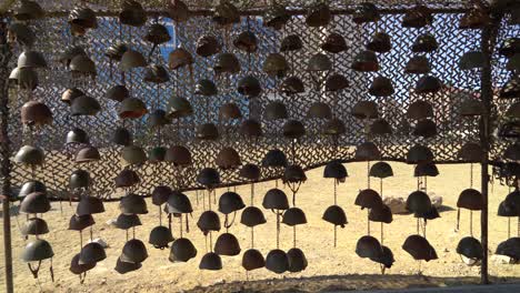 Display-of-dead-Armenian-soldiers-helmets-in-Trophy-park,-Baku,-Azerbaijan