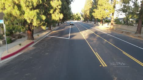 aerial-view-of-car-passing-by