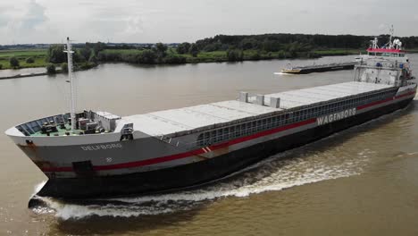 Aerial-Over-Delfborg-General-Cargo-Ship-On-Oude-Maas-Near-Barendrecht