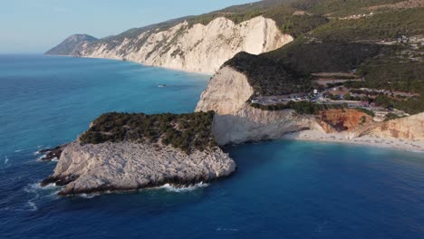 Cinematic-orbit-shot-of-the-fallen-rock-of-the-Porto-Katsiki-beach-in-Lefkada,-Greece-after-the-earthquake