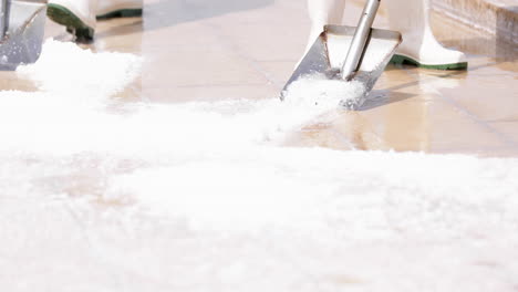 Harvesting-Of-Natural-Salt-Deposits-On-The-Pans-At-Rio-Maior-Salinas-In-Portugal